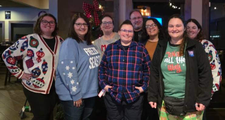 SSA Association Council members at the 2025 holiday party in festive sweaters.
